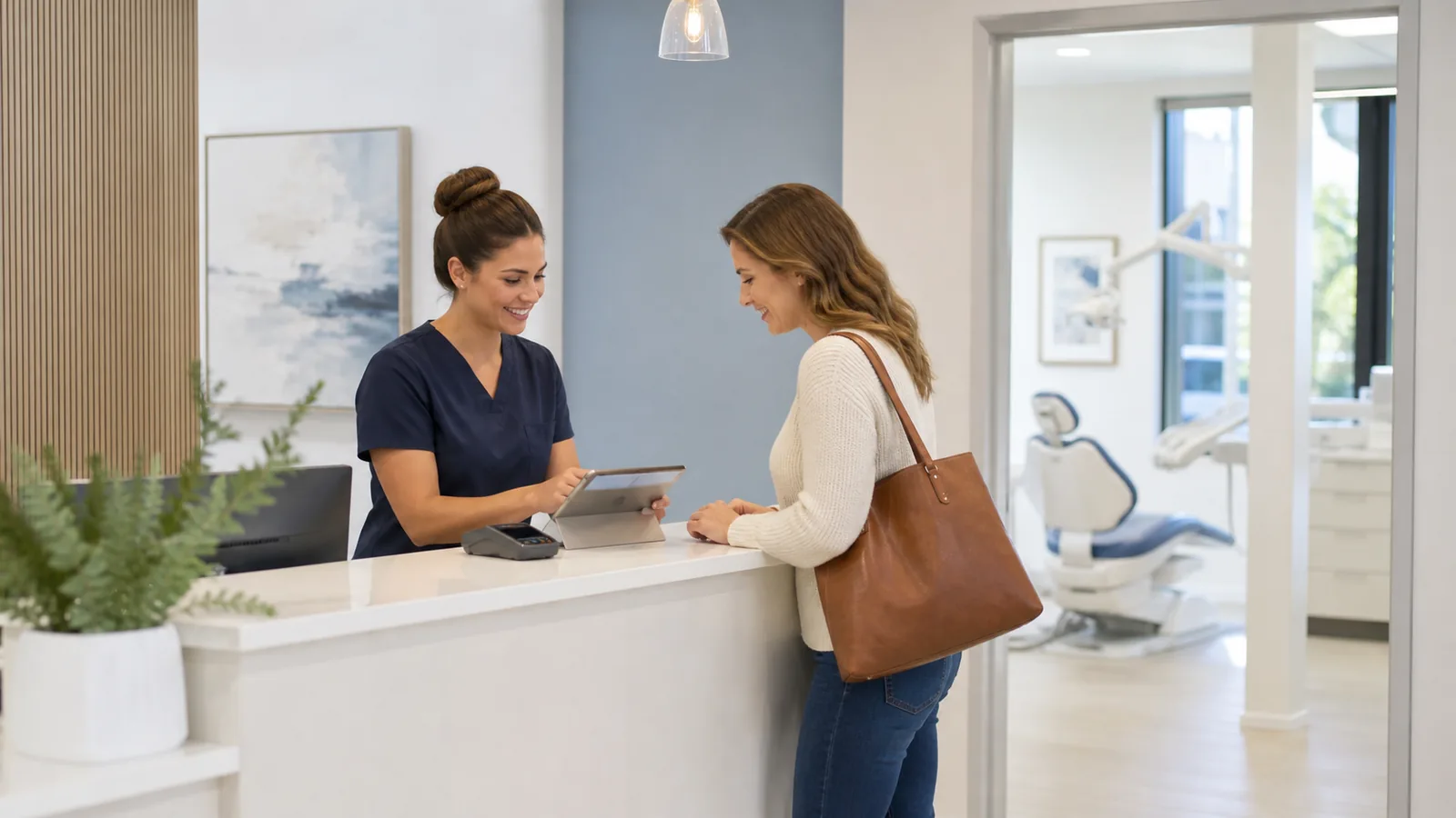 Dental practice front desk payment moment